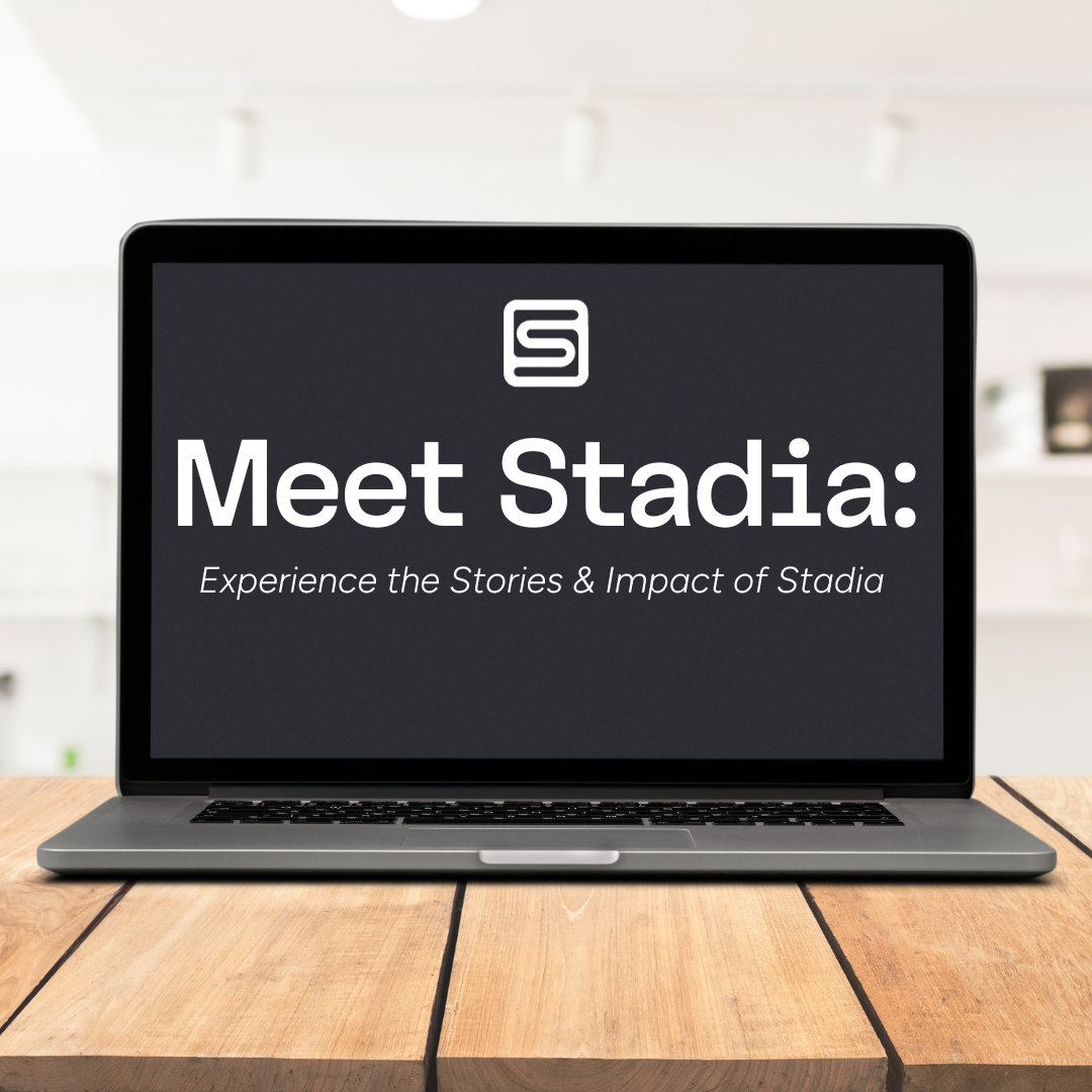 A laptop that has text on it and says, "Meet Stadia: Experience the Stories & Impact of Stadia"